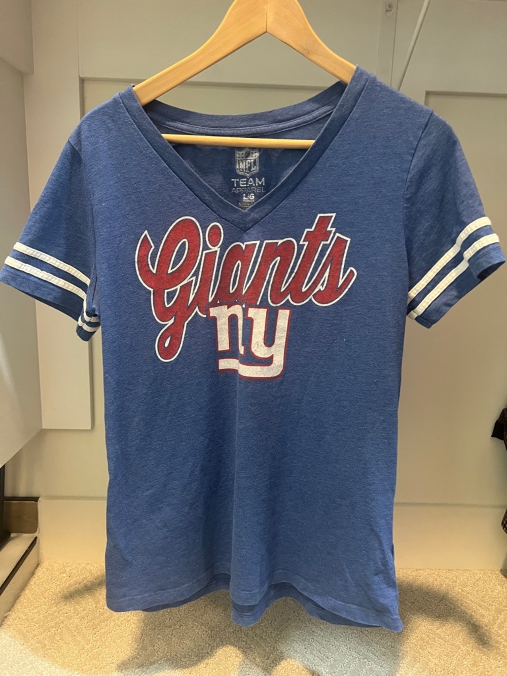 Team Apparel Blue Short Sleeve V-Neck 'Giants' Tee with Red and White Logo
